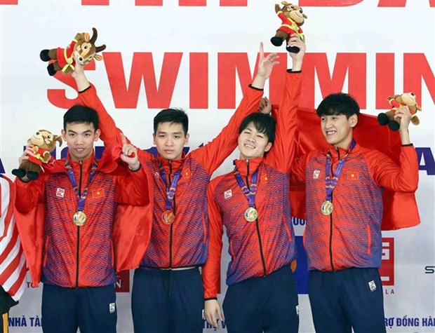 SEA Games 31 Vietnamese swimmers set record in men s freestyle relay event
